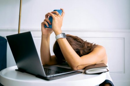 woman frustrated at laptop