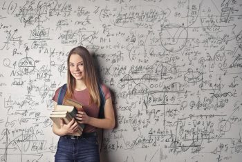 college woman with books in from of white board with equations; Saving for Retirement in College