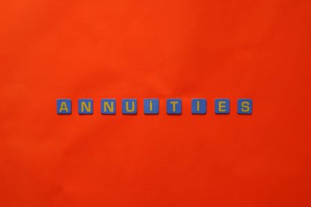 red background with annuities in block letters; Consider an Annuity Right Now