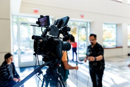 camera team setting up equipment; Media-for-Equity Can Supercharge Tech