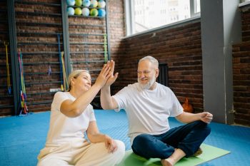 older couple exercising in retirement; Why Preventive Care is One of the Smartest Money Moves