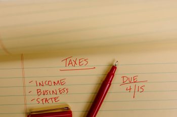 Taxes on the yellow note pad; Entrepreneur Tax Mindset Stop Overpaying Without Playing Games