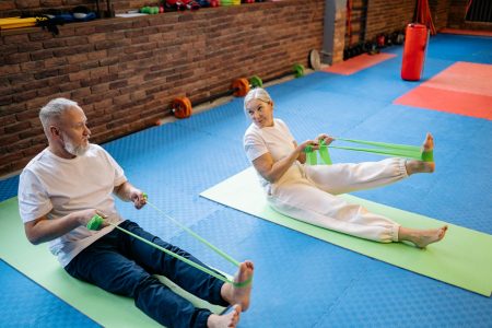two seniors exercising on mats; A Comprehensive Guide to Staying Active After 60