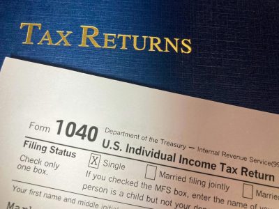 Tax Return plus 1040 form; Turning Your Tax Windfall into a Wealth Engine