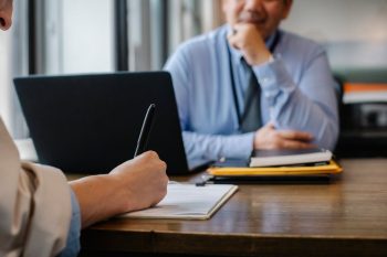 side hustle worker considering options; When Extra Income Actually Makes You Poorer