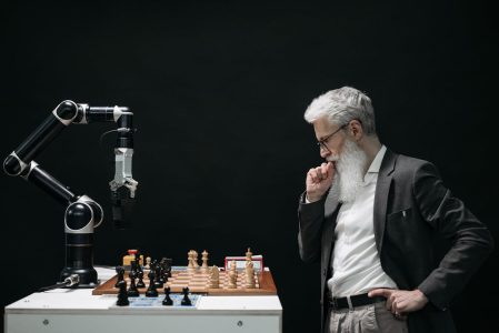Person using AI-powered financial app on smartphone for money management
