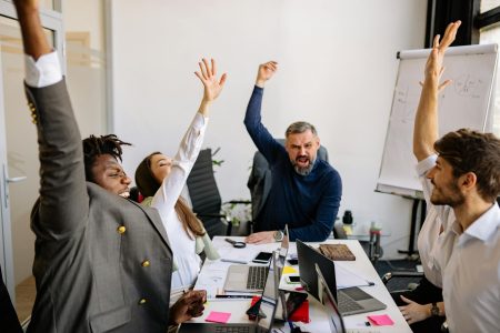 team all raising their hands; I’ve Seen Hundreds of Founders Fail While ‘Growing’