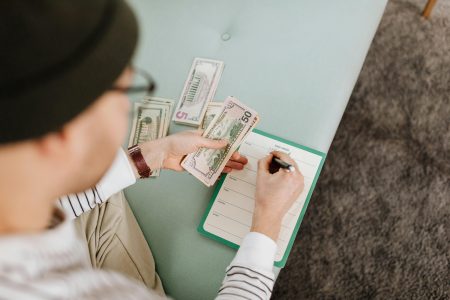 a person tackling a simple financial plan; One-Page Financial Plan Replaced Spreadsheet