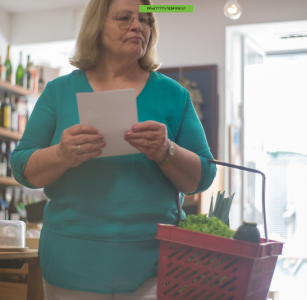 woman worried and confused at grocery store; Your Grocery Bill Keeps Climbing How to Fight Back
