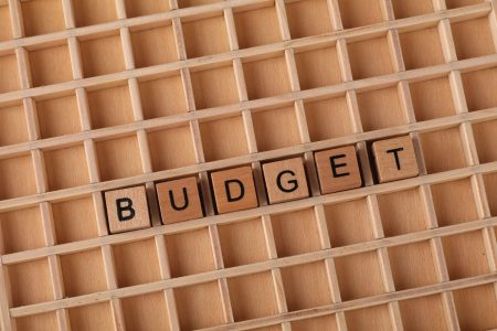 budget in block letters in a wooden case; 50:30:20 Budget Explained Does the Rule Still Work