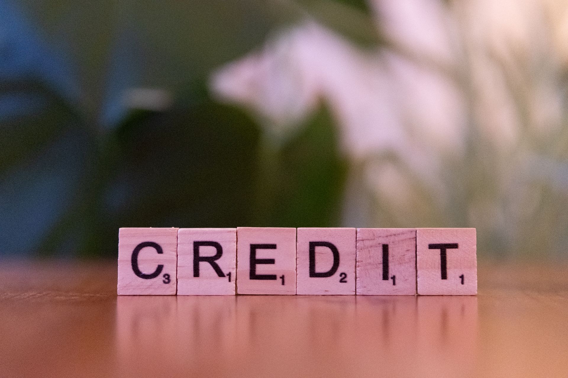 credit written in block letters; Credit Score Do You Need to Buy a House