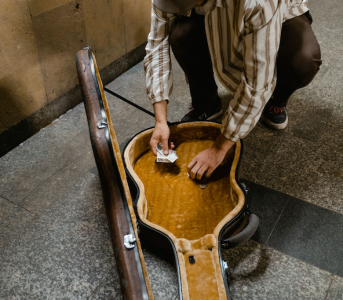 a guy hiding money in his old guitar case; Savings vs CDs Where Should Your Cash Sit Right Now?