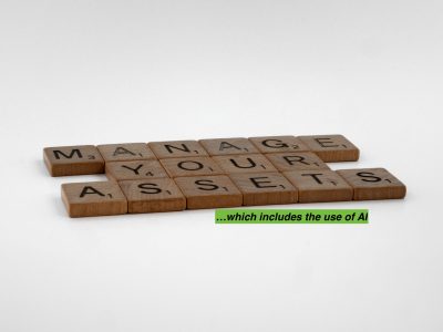 manage your assets which includes AI written in wood tiles; What Entrepreneurs Need to Know About AI