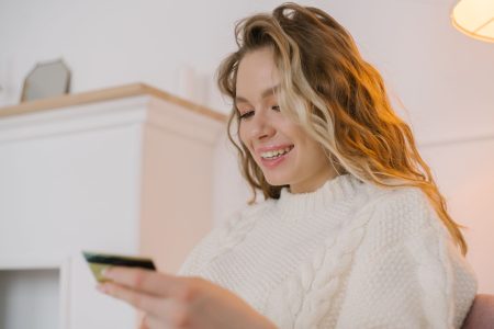an entrepreneur looking at the money made from recurring subscriptions; Why Subscriptions are Inflation’s Worst Enemy