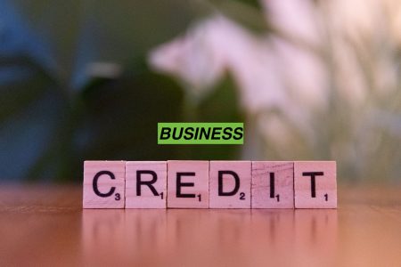 words business credit on a desk; How to Build Business Credit From Day One