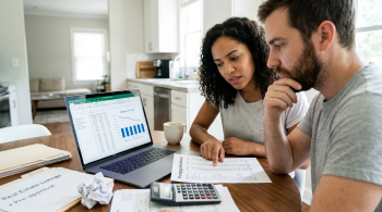 couple looking over their new mortgage rate;