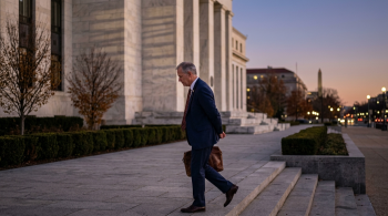Kevin Warsh going into the federal building; Warsh keeps future Fed plans private