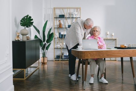 a couple choosing and loving work even in retirement; Earn Extra Income Online in Retirement