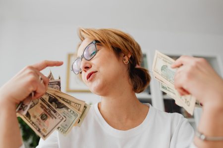 a woman happy to have her retirement money;