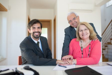 couple meeting with their trusted financial advisor;;